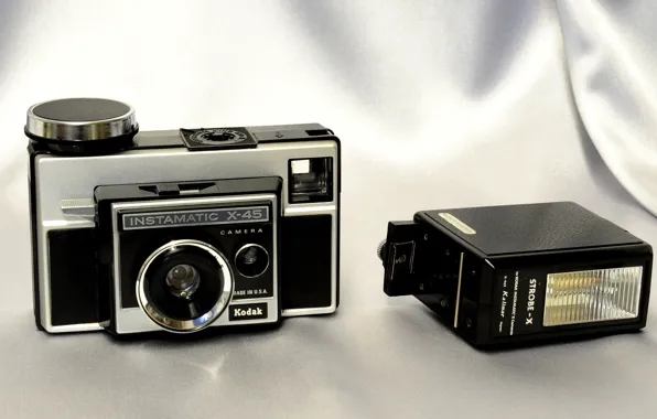 Картинка фон, камера, американская, затвор, диафрагма, электрический глаз, CdS-метр, Kodak Instamatic X-45, фотовспышка SITROBE-X